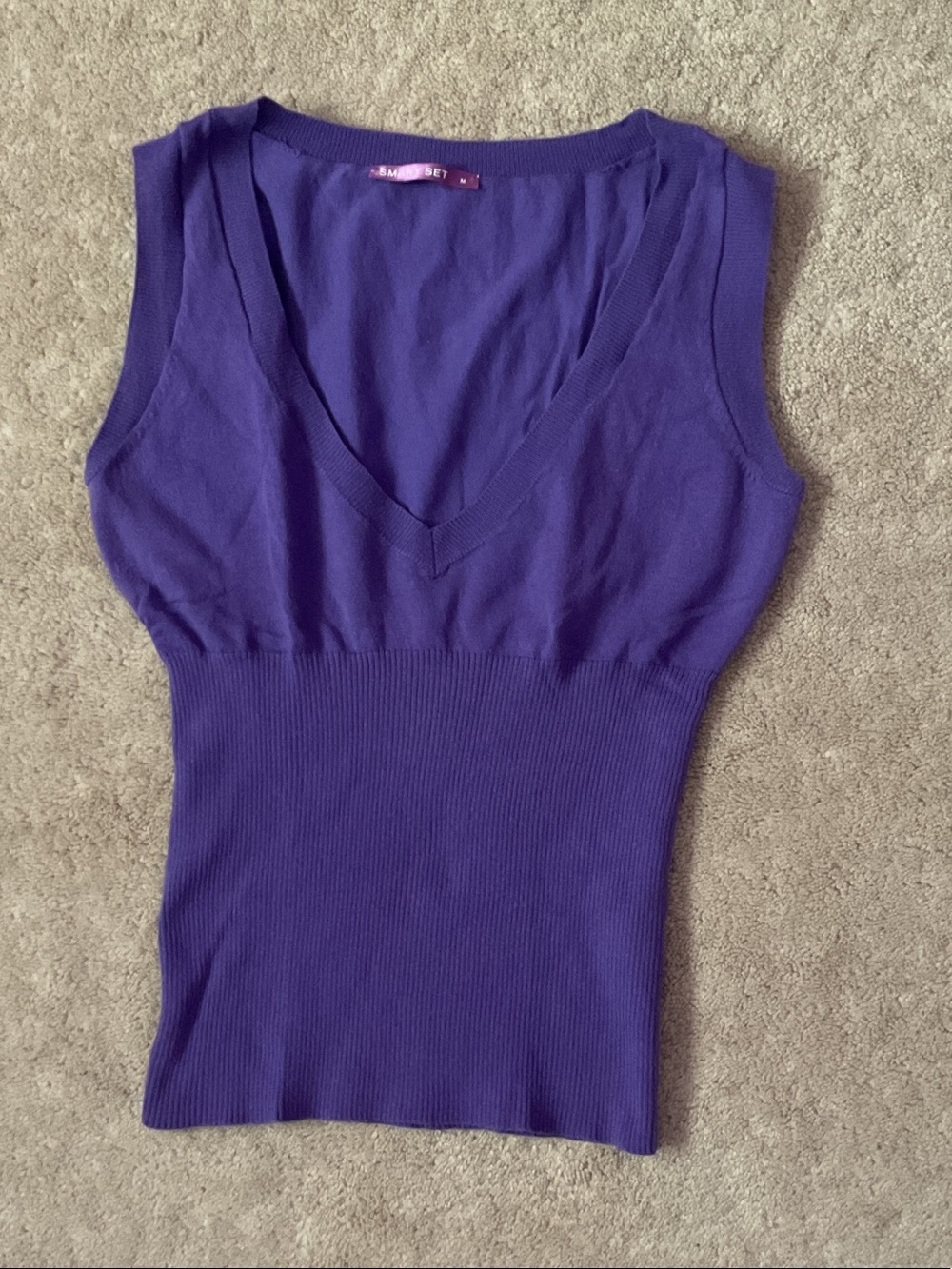 Mid waist cinched sweater vest